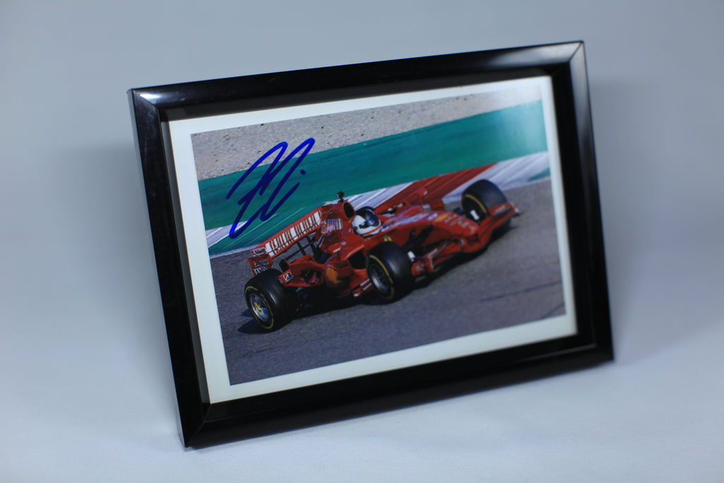 Photograph by Kimi Räikkönen Scuderia Ferrari Formula 1