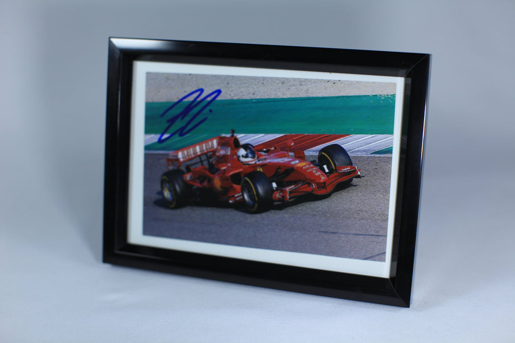 Photograph by Kimi Räikkönen Scuderia Ferrari Formula 1