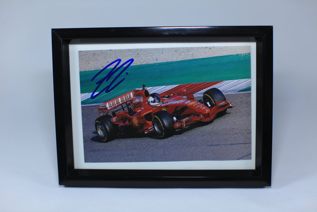 Photograph by Kimi Räikkönen Scuderia Ferrari Formula 1